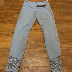 Adorable work out pants. Comfortable! Lace bottom cuffs. New with tags.